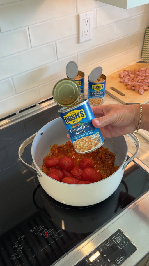 #BushsBeansPartner Creamy Bean and Tomato Soup ⬇️Recipe⬇️ @bushsbeans 

A cozy, comforting dinner that’s full of flavor and surprisingly easy to pull together. I always keep Bush’s Beans in the pantry because they make it the best – from the first bite to the last. 

What you’ll need: 

3 tbsp Butter 
1 cup Yellow Onion, chopped 
5 Garlic Cloves, minced 
1 cup Carrots, chopped 
1 cup Celery, chopped 
6 oz Tomato Paste 
2 tbsp Italian Seasoning 
4 cups Vegetable Broth 
2 15oz cans Bush’s Cannellini Beans 
1 15oz can Bush’s Great Northern Beans 
1 large can of Whole Peeled Tomatoes 
1/2 cup Parmesan, grated 
3/4 cup Heavy Cream 
4 Kiolbassa Sausage Links, chopped 

Melt the butter in a large pot on medium heat. Add onion, carrots, celery and garlic, season with Italian seasoning and cook until onions are translucent, about 8 minutes, stirring occasionally. Add tomato paste, tomatoes, 1 1/2 cans of Bush’s Cannellini Beans, 3 cups of broth. Bring to a simmer and cook for 10 minutes. Pour contents of pot in a blender and puree the soup until smooth. In the large pot, quickly brown sausage. Pour the puree back in the pot with the sausages. Pour in remaining cup of broth and cream more or less depending on desired consistency. Add in remaining cans of beans and stir in Parmesan. Enjoy.