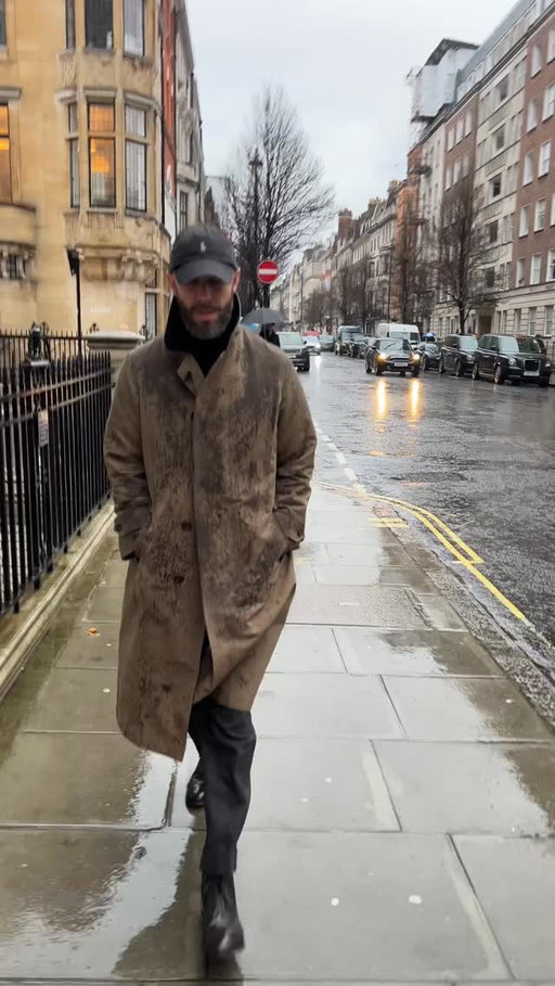 Walkie Talkie 61

Walking out of the showroom yesterday 
Talking about good clothes for the rain

Wearing:
- Permanent Style rider’s raincoat
- Rubato black roll neck
- Whitcomb & Shaftesbury charcoal trousers in Fox flannel
- Alden color-8 cordovan boots on the modified last