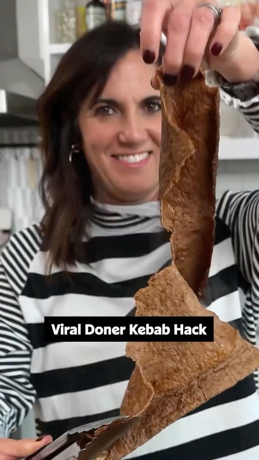 The key to this viral Doner Kebab Hack is parchment paper. 😉🍖 Roll out your kebab meat onto the parchment paper, fold it up, and watch the magic happen as it mimics meat sliced from a whole lamb—but in half the time! 🐑

Get the full recipe details in the @allrecipes bio! 

✨Inspiration: @mezemike 
🧑‍🍳: @nicolemcmom
#kebab #cookinghack #lamb #easydinner easyrecipes easyhacks