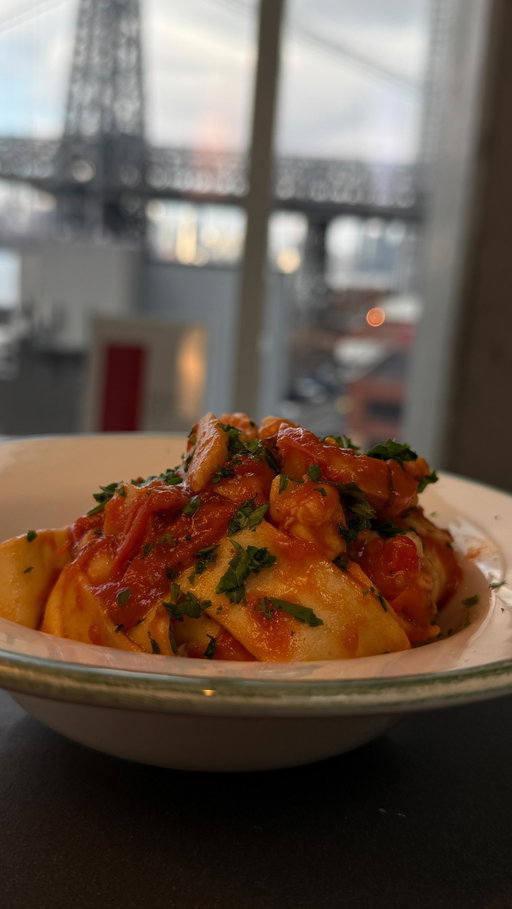 🦐🍝 Dive into flavor with this rich and rustic Seafood Pasta! Scallops, shrimp, cherry tomatoes & white wine all come together in a comforting coastal dish straight to your holiday tables 🇮🇹✨ @giallolovesitaly 

📝 Ingredients:
14 oz pasta (400 g)
1 1/3 cups cherry tomatoes, sliced (200 g)
2 cloves garlic
1 bell pepper, diced
1 1/3 lbs scallops (600 g)
14 oz shrimp (400 g)
2 tablespoons olive oil (25 ml)
2/3 cup dry white wine (150 ml)
3/4 cup tomato purée (200 g)
Fresh parsley, chopped
Salt to taste

👩‍🍳 Instructions:
1. Slice the cherry tomatoes and dice the bell pepper.
 In a large casserole or deep skillet, heat the olive oil. Add the tomatoes, bell pepper, whole garlic cloves, and a bit of chopped parsley.
 Cook over high heat for 2–3 minutes, stirring frequently, then reduce to low heat. Cover and simmer for about 10 minutes.
2. Cut the scallops and shrimp into smaller pieces, then add them to the casserole.
 Increase the heat and cook for 3–4 minutes, stirring.
 Deglaze with white wine and let it cook until the alcohol has evaporated.
3. Stir in the tomato purée. Mix until smooth and season with salt.
 Simmer gently for about 20 minutes, uncovered.
4. Meanwhile, cook the pasta in boiling salted water.
 Drain the pasta a couple of minutes before it’s fully cooked (al dente) and transfer it directly into the sauce to finish cooking for maximum flavor absorption.
5. Serve immediately, topped with freshly chopped parsley.

#giallolovesitaly #SeafoodPasta #ItalianDinner #HomemadePasta #ShrimpLovers