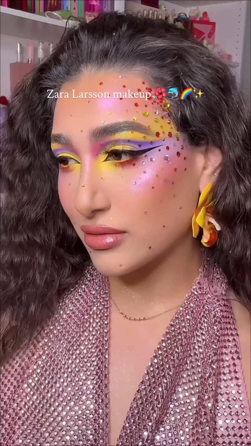 🌺🐬🌈✨ MIDNIGHT SUN✨🌈🐬🌺

You know that I had to hop on the @zaralarsson effect trend. @sophiasinot you are a visionary genius and thank you for bringing creative makeup back to my fyp. 💖☀️🌅

PRODUCT DETAILS 👉

🌺 BASE 
@danessa_myricks Yummy Skin Glow Serum 
@milkmakeup Hydrogrip Gel Tint 
@hauslabs Concealer 
@rarebeauty Warm Wishes Effortless Bronzer Stick 
@beauty.creations.cosmetics Liquid Blush (OK Coral) 
@kimchichicbeauty Puff Puff Pass Loose Setting Powder *USE CODE “Lexilalamakeup15” FOR 💰 OFF*
@unearthlycosmetics Spring Magic Incandescent Blush Palette 
@bellabeautebar Oracle Chrome Highlighter Palette *USE CODE “Lexilalamakeup” FOR 💰

🐬 BROWS 
@nyxcosmetics The Brow Glue Crazy Lift 
@benefitcosmetics Precisely, My Brow Pencil 

✨ GLITTER
 @jelliwinkcosmetics Loose Pigments (Snow, Rouge, Solana, Imogen, Ultraviolet, Bahama) 
@onesize Glitter Spray

🌈 EYES 
@colourpopcosmetics Fade Into Hue, Matte About Hue Palette, & BFF Crème Liner (Punch)
@kimchichicbeauty Holy Sharts Palette *USE CODE “Lexilalamakeup” FOR 💰 OFF* 
@cosmic_brushes Serenity Palette 
@exocosmetics Just The Tip Liner 
@citycolorcosmetics Canvas Base (Carousel) 
@lorealparis Extensionist Mascara 
@jlashusa Kawaii Dollz Lashses (Sunshine) 

✨ LIPS 
@morphebrushes Signature Lip Pencil (Wifey)
@halfmagicbeauty Crystal Butter Lip Balm (Shell-ebrity)