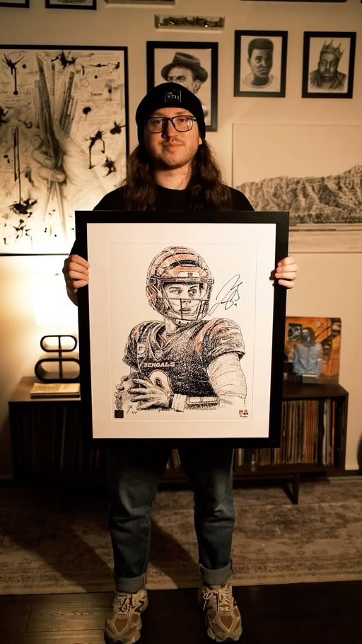 13 hours ✍🏼 

I am so excited to announce my second collaboration with @fanaticsauthentic ! My favorite parts are the textures in the jersey and how well the orange makes the whole drawing pop 🔥 

So glad I got my hands on a signed print 🧡🖤

Which athlete should I draw next?

#football #joeburrow #bengals #wordart #micrography #penandink #detail #portrait