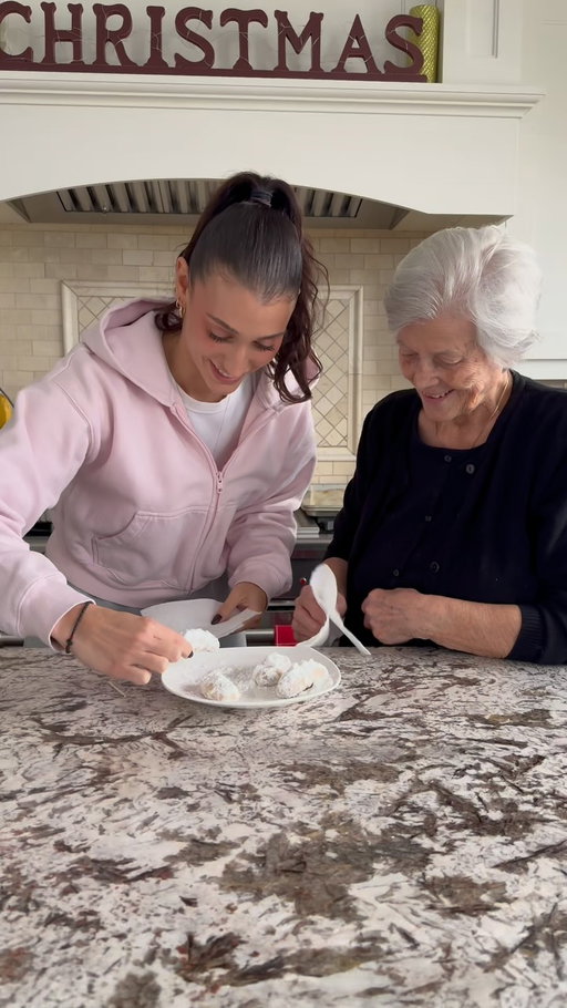 Pt2. Of Christmas cookies with Yiayia Maria 🎄🇬🇷

Kourabiedes😍 ps.  We made 2 kinds - this is the version with almonds… you can do them without. 

Recipe:
1. 1/2 pound room temperature unsalted butter
2. 1/2 cup icing sugar
3. 1 tbsp vanilla
4. 1/4 cup Ouzo
5. 1/4-1/2 cup roasted almonds (optional)
6. 3 cups flour 

Step by step: 
1. Take butter out and let it get to room temp
2. Add icing sugar to the bowl with the butter and begin to mix with fork or spoon
3. Take out mixer and begin to whip
4. While whipping add ouzo & vanilla
5. Fold in flour to mixer and keep going until it starts to harden
6. Optional step: halfway through folding in flour, add in roasted almonds
7. Remove mixer and begin to mix with hands
8. Preheat oven to 350
9. Begin to shape kourabiedes into desired cookie style
10. Bake for 25-30 on 350
11. Let cool all the way and then roll them in more icing sugar - There is no measurement for this just cover them fully 
12. You can place them in cupcake sheets
13. Enjoy & serve! 

#content #greekrecipe #cooking #minivlog