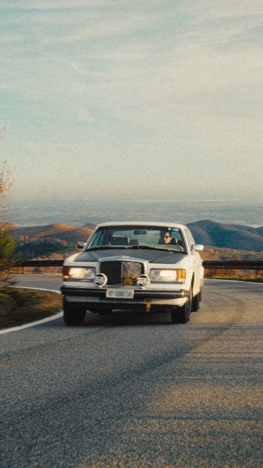 Riccardo Pozzoli’s world spans boardrooms and backroads, digital strategy and analogue thrills. His latest obsession? A 1985 Bentley Mulsanne Turbo, reborn as a rally-inspired icon.​

Originally a symbol of refined British luxury, the Mulsanne Turbo was the car that reignited Bentley’s performance heritage. Pozzoli’s version adds a twist: raised suspension, off-road tyres, matt-black detailing, and a yellow engine fan peeking through the grille. It’s a Bentley with attitude - yet inside, the leather and wood whisper tradition.​

​From the shores of Lake Maggiore to twisting mountain hairpins, Pozzoli relishes the duality. “Sometimes we’re too focused on the destination,” he says. “If you want to enjoy the journey, you need something that pushes you to live it.”​

This car does exactly that. A 40-year-old saloon trading its twilight years for a life of adventure - proof that elegance and excitement can share the same road.​

Discover more via the link in our bio.​

#Bentley #BentleyStories