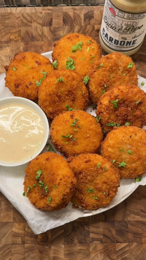 cheesy cacio e pepe croquettes 🧀

potato croquettes but with pancetta, cheese, and @carbonefinefood Cacio e Pepe sauce 

comment “recipe” to receive the full recipe via DM! the full detailed recipe is also on my website 🔗 linked in bio!

#CarboneAtHome #CFFPartner #croquette