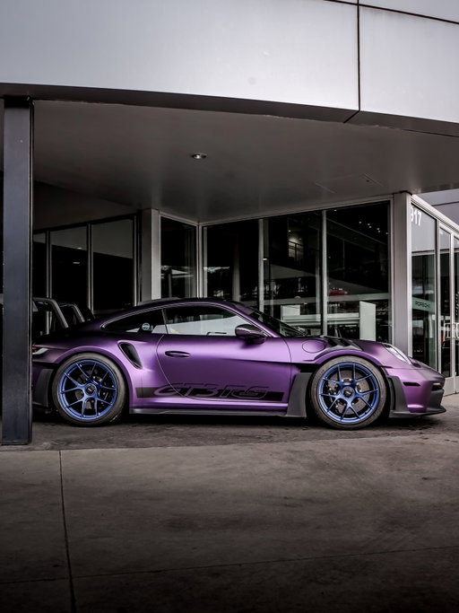 Certified Pre-Owned 2025 911 GT3 RS with Weissach Package in Black over Black Leather and Race-Tex with Racing Yellow Deviated Stitching interior. This gorgeous GT3 RS was custom ordered here by a long time Porsche enthusiast client that has an incredible eye for detail and this GT3 RS is a great example. The car came very well equipped with nearly $65,000 in factory options and was wrapped in protective vinyl film to replicate Viola Purple Metallic paint before first delivery. The Satin Indigo Blue wheels and accents compliment the Viola Purple Metallic very well. For protection from UV rays, all the glass is coated with clear UV film on the inside of the windshield, both side windows and the rear window. Unlimited Mile Certified Pre-Owned Warranty until January 2, 2031. 

Price: $435,890
Miles: 1,282

Original Equipment:

- Weissach Package
- BORN IN FLACHT Under Door Puddle Light Projectors
- Deletion of Model Designation on Rear
- Front Axle Lift System
- Porsche Ceramic Composite Brakes
- Calipers in High Gloss Black
- Wheels in Satin Indigo Blue
- GT3 RS Forged Lightweight Magnesium Wheels
- Deviated Stitching Interior Package
- Central Tachometer in Racing Yellow
- Steering Wheel and Gear Lever in Black Leather
- Seat Belts in Racing Yellow
- Fire Extinguisher
- Door Pull Loops in Black
- Center Console Lid in Race-Tex with PORSCHE Logo
- Carbon Fiber Floor Mats with Leather Edging
- BOSE Surround Sound System
- Dashboard with Deviated Stitching in Racing Yellow
- Rear Side Panel with Deviated Stitching in Racing Yellow
- Center Console Lid with Deviated Stitching in Racing Yellow
- Knee Pad with Deviated Stitching in Racing Yellow
- Auto Dimming Mirrors with Integrated Rain Sensor
- Parking Sensors Rear
- Preparation for Porsche Dashcam Front and Rear
- Ambient Lighting

Schedule your visit to see this incredible Certified Pre-Owned 2025 911 GT3 RS with Weissach Package at Porsche Colorado Springs today! 719-219-1911

#gt3rs #992gt3rs #911gt3rs #porsche #porschecolorado