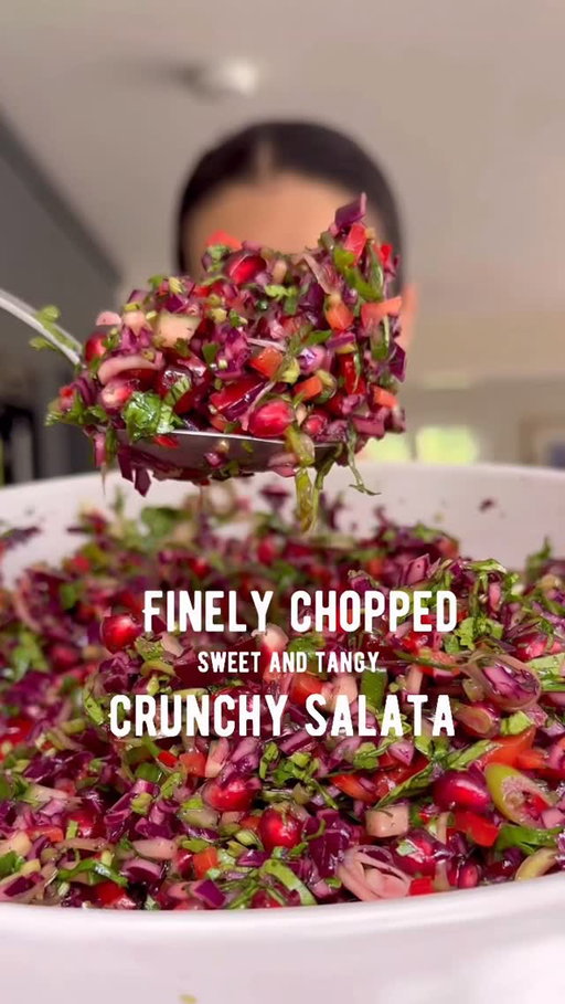 Ok, what are you having for (lunch or) dinner tonight / tomorrow / the day after, because red cabbages and pomegranates are officially in season, and this is THE perfect salad to have ready and on repeat, now and always 💚🧡❤️💜 every time I make this salad I remember why I (and MILLIONS OF YOU) love it so much 🫶🏼🩷❤️💚🧡💛💜 thank you so much for all the love and shares - If you haven’t made it yet, where have you been? Well, that doesn’t matter anymore, because you know what I’m going to day - please make it (you can watch the video here and also on my YouTube channel from a few years back)

The key is to chop EVERYTHING as finely as possible (except for the pomegranate seeds and dressing ingredients obvs) and you will notice ALL the difference - dare I say, it’s even better the next day! #pleasemakeit

INGREDIENTS

250g red cabbage, finely diced

1/2 English cucumber (deseeded) / 2 medium middle-eastern cucumbers (deseeded), finely diced 

1 large red Romano pepper / kapya biber, finely diced

2 spring onions, finely sliced 

50g fresh coriander, very finely chopped (stalks and leaves)

200g pomegranate seeds

3 tbsp extra virgin olive oil

2 tbsp freshly squeezed orange juice 

1 tbsp white wine vinegar 

2 tsp dried mint 

1 tsp honey 

2 tbsp pomegranate molasses 

1/2 tsp sea salt flakes (or more to taste) 

#melizcooks #salad #choppedsalad #finelychopped