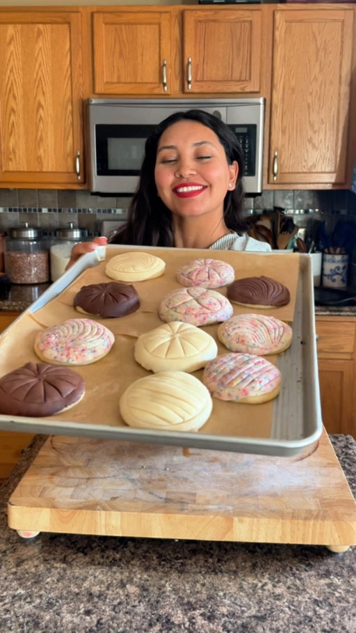 Conchas #2 

What you’ll need for the dough: 
3.5 cups of AP flour 
3/4 cup warm milk 
2 tsp baking powder 
3 eggs room temp 
1 pack of instant yeast 
1 cup of sugar 
Mexican cinnamon 
Whole anise 
10 tbs soft butter 
Pinch of salt 

For shell: 
1.5 cup of flour 
1.5 cup of powdered sugar 
11 tbs of soft butter 
*chocolate powder optional
*vanilla extract
✅ make sure the shell covers the entire bread. 

Bake at 350° for 15-20 min check on them #mexicanfood #mexicanpan #pandulce #conchas