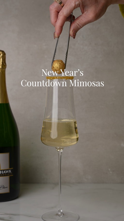 If this doesn’t have you counting down already, we don’t know what will. 🥂✨

Shake things up for New Year’s with a golden twist on a classic mimosa—watch an OJ sphere melt into crisp Cooper’s Hawk Blanc de Blanc for a little sparkle in every sip.

You’ll need:
🍊 Orange juice (frozen in a round mold)
✨ Edible gold glitter
🥂 Gold sugar crystals
🍾 Cooper’s Hawk Blanc de Blanc

How to:
-Freeze orange juice in a round ice cube tray
-Roll each sphere in edible gold glitter until fully coated
-Dip the rim of your champagne glass in gold sprinkles
-Fill the glass with Cooper’s Hawk Blanc de Blanc
-Drop in your shimmering OJ sphere and enjoy the show! 

Simple. Festive. Made for the countdown. 🕛✨