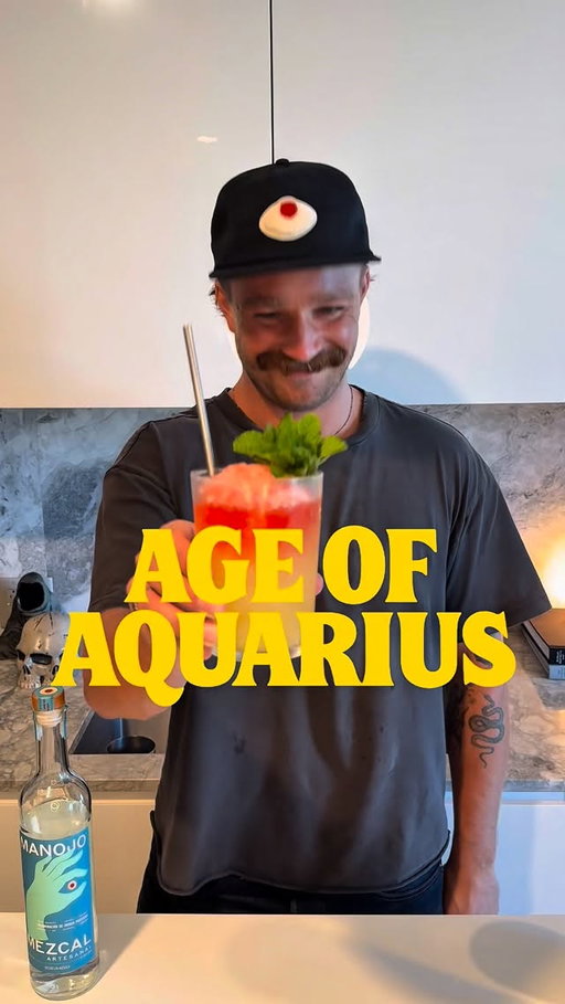 Age of Aquarius 

#ad #paidpartnership #manojopartner #21+

One of my favorite refreshing Mezcal cocktails. Nailing this drink really comes down to using a great Mezcal. Grab a bottle of @manojomezcal and try it out!  Recipe:
1.5oz Mezcal @manojomezcal 
.5oz Campari (Float)
.75oz Passionfruit Syrup
.25oz Honey Syrup
.75oz Lime

Whip shake ingredients (except Campari) with a few small pieces of crushed ice until the ice is melted. Open pour into a glass 2/3 full of crushed ice. Add straw. Top with more ice. Float Campari over the top and garnish with a mint sprig.