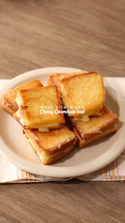 🍞 Mini Caramelized Toast

📝 Recipe

4 Slices • Bread
Mozzarella Cheese
60g • Butter
50g • Sugar

Instructions:

• Bread
- prepare a slice of bread
- stack another bread on top
- cut the bread into 4 parts
- put mozzarella cheese inside

• Buttered Sugar
- mix together butter and sugar
- spread the buttered sugar on top of the bread

• Cooking; Bread
- heat pan in medium heat, once it’s hot, turn stove into low heat
*note: always put the heat in low heat all the time
- fry the buttered side of the bread on the pan
- flip the bread to cook the other side of the bread

• Finishing; Caramelized Toast Bite Sized
- once the bread is a bit cold, it’s gonna be crunchy because of the caramelized sugar then you can enjoy!

//

Easy recipe at home with IC! 👩‍🍳

I got a friend outside of the window, watching me make this recipe 🥺 I had to put the cat in my footage! 🐾

—

#breadrecipe #caramelized #cheesepull