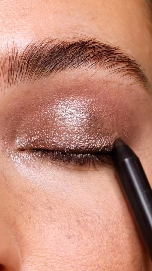 Because the best looks last beyond the ball drop ✨ Save this mesmerizing, three-step look that keeps on sparkling long after midnight:

1️⃣ Sweep Caviar Stick Eye Shadow in shade Amethyst across the entire lid and along the lower lash line.
2️⃣ Pop shade Moonlight on the center of the lid and inner corner of the eye for a luminous touch.
3️⃣ Finish with Caviar Eye Liner in shade Espresso for added definition.
