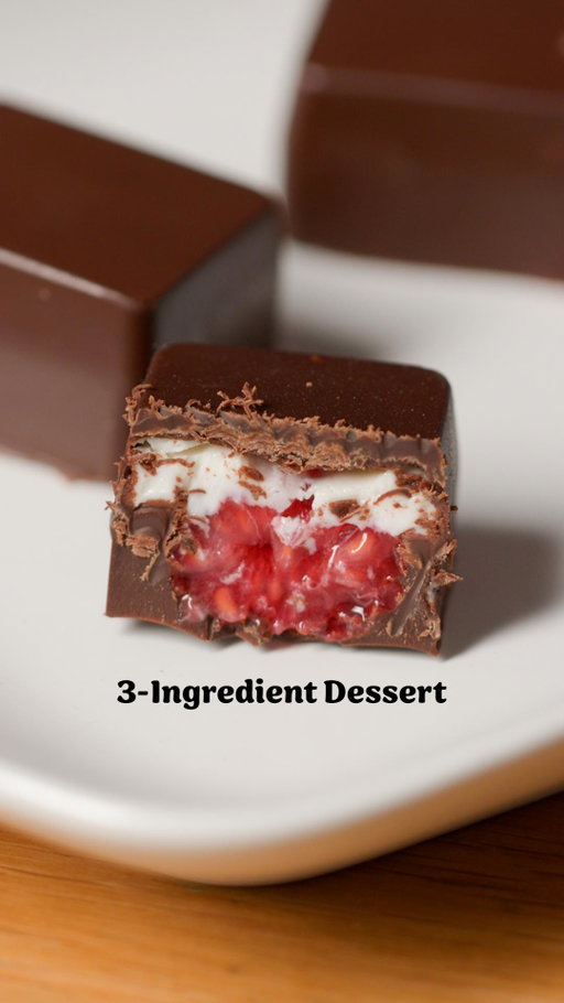 These 3-Ingredient Raspberry Chocolate Cups are perfect for when you're craving something sweet! Just pop them out of the freezer when you're ready to eat. Find the recipe on Tasty.co or in bio!