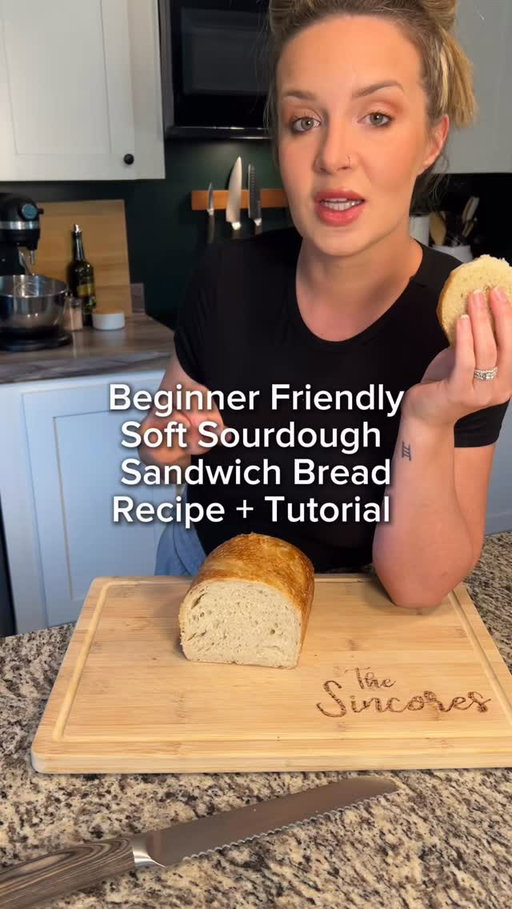 🍞✨ Beginner-Friendly Soft Sourdough Sandwich Bread ✨🍞

I first shared this back in August for back-to-school, but it felt only right to bring it back for the new year — especially with so many new faces here. This is one of my most approachable loaves and we’ll be doing inclusions with this dough soon, so I wanted it fresh in your saves.

(Also yes — I mention dental surgery in this video. I’m fully healed and all good now 🫶)

Ingredients

• 500g bread flour
• 150g active sourdough starter
• 300g water
• 25g maple syrup (or honey)
• 20g avocado oil (or butter / olive oil)
• 10g salt

Instructions

1️⃣ Mix the water and starter first.
2️⃣ Add the remaining ingredients and mix until fully combined.
3️⃣ Cover and rest for 30 minutes.
4️⃣ Stretch & fold, then rest 30 minutes.
5️⃣ Coil fold, rest 30 minutes.
6️⃣ Final coil fold, leaving the dough seam-side down.
7️⃣ Let the dough bulk ferment until fully fermented. 
8️⃣ Shape:
• Gently stretch into a rectangle
• Fold each side halfway toward the center
• Roll up tightly, tuck the ends under
• Place into a parchment-lined loaf pan
9️⃣ Cover and cold ferment overnight in the fridge.
🔟 Bake day:
• Preheat oven to 425°F
• Remove dough from fridge
• Score 3 straight lines across the top
• Lightly mist with water
• Cover with a second loaf pan
➡️ Bake 20 minutes covered
➡️ Remove top pan, bake 10 minutes uncovered
➡️ Remove loaf from pan and bake 5–10 minutes directly on the rack.
Let rest 1 hour before slicing.

Soft, fluffy, and slices like a dream 🤍