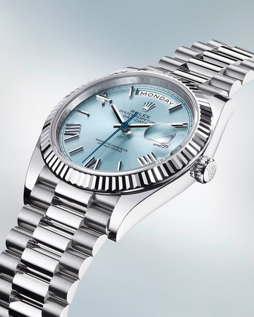The @Rolex Oyster Perpetual Day-Date 40 in 950 platinum featuring an ice-blue dial with deconstructed Roman numerals, a fluted bezel and the President bracelet. #Rolex #DayDate #OfficialRolexRetailer