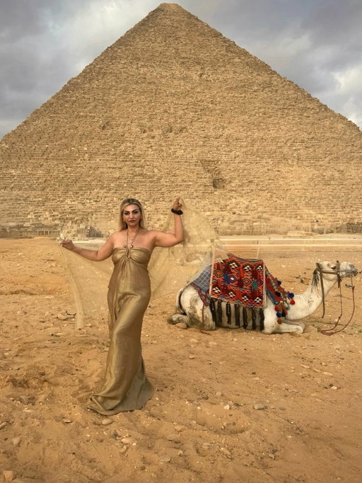 Standing where history has stood for over 4,500 years—the Pyramids of Giza! 🐪✨the first Wonder of the World!

Ancient. Powerful. An unforgettable feeling.💫

I stood still, and time moved through me—mystic, royal, infinite! 👑

Channeling my inner Cleopatra beneath these timeless triangles 🔺🔺🔺
Egypt, you have my heart! ♥️ 

#pyramidsofgiza #visitcairo #wonderoftheworld #queencleopatra #thisisegypt
