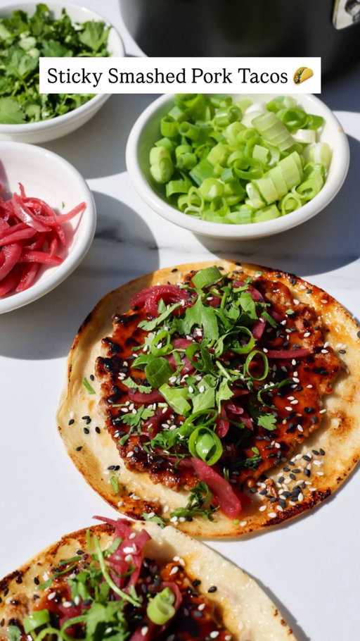 Sticky Smashed Pork Tacos 🌮�Low-effort, big-flavour weeknight dinner that comes together fast and hits every craving - sticky, crispy, fresh, and a little spicy.
Serves 4

🛒 Ingredients
Seasoned Pork Mince
* 680g pork mince
* 1 tbsp fresh ginger, finely grated
* 1 tbsp fresh garlic, minced
* 1 tbsp soy sauce
* 1 tbsp honey
* 1 tsp cayenne pepper
* 1 tsp garlic powder
* 1 tsp plain flour

Sticky Glaze
* 3 tbsp soy sauce
* 3 tbsp honey
* 1 tbsp sesame oil
* 1 tbsp hoisin sauce
* 1 tbsp sesame seeds
* Juice of ½ lime
* 1 tsp sriracha
* 1 tsp fresh ginger, grated

Smashed Tacos
* 8 @farrahsnz low carb tortillas
* 2 tbsp olive oil

To Finish
* Fresh coriander, chopped
* Pickled red onions
* Spring onions, sliced

👩‍🍳 Method
1. Season the Pork
Add all pork mince ingredients to a bowl and mix well until fully combined. Set aside.

2. Make the Sticky Glaze
Add all glaze ingredients to a small saucepan. Bring to the boil, then reduce heat and simmer for 3–4 minutes until slightly thickened. Remove from heat.

3. Smash the Tacos
Divide the pork mixture into 8 equal balls. Place one ball onto each tortilla and press it out evenly over the surface.

4. Cook
Heat olive oil in a large frying pan over medium-high heat.�Place tortillas pork-side down and cook for 2 minutes until golden and crispy.�Flip and cook for 1 minute until the tortilla edges are crisp.
Brush the pork with the sticky glaze, flip again, and cook for another 30 seconds. Flip once more if needed to crisp the tortilla.
Repeat with remaining tacos.

5. Serve
Brush with any remaining glaze and finish with fresh coriander, spring onions, and pickled onions. Serve hot and enjoy immediately.

✨ Tip: These are unreal straight from the pan - crispy edges, sticky pork, and fresh toppings make them perfect for sharing (or not). @brightmomentco

#food
#foodie
#instafood
#foodporn
#dinnerideas