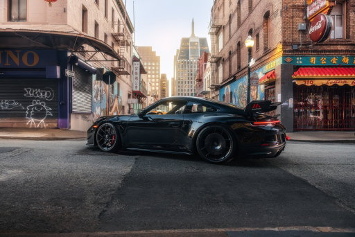 City lights bouncing off the bodywork, streets finally quiet enough to hear your thoughts, moments like this are why you wait for the roads to clear before you drive.