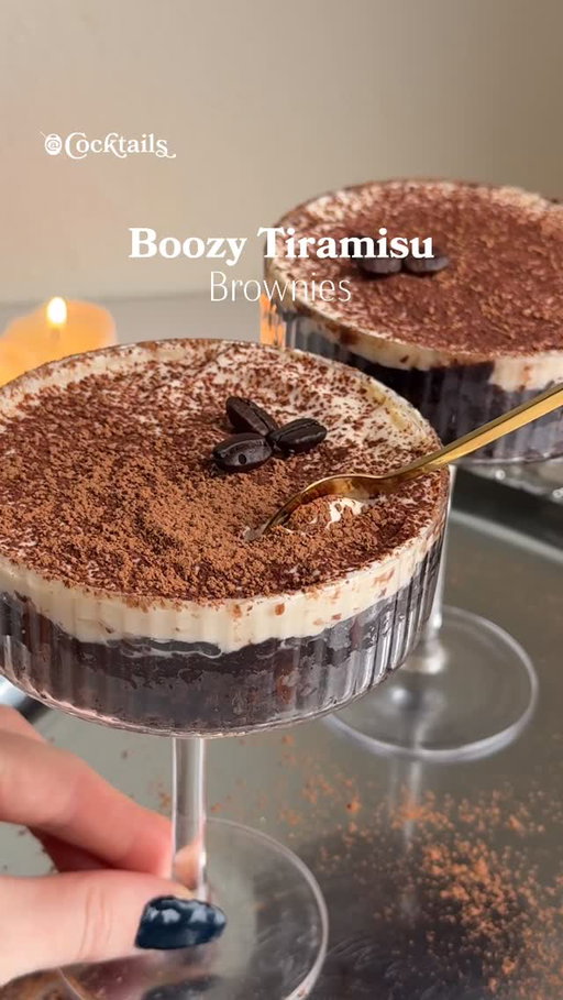Never knew what true love was until we met a boozy tiramisu brownie. 😌☕

Ingredients (serves two martini glasses):
- Brownies (box mix or homemade both work totally fine!)
- 1.5 oz. coffee liqueur
- 1 tbs. mascarpone
- 1/2 cup heavy cream
- 1 oz. Baileys
- 2 tsps. sugar
- cocoa powder
- espresso beans

Steps:
1. Bake brownies then allow to cool
2. Use a martini glass to cut out a slice of the brownie that will perfectly fit in the glass
3 Puncture holes into the top of the brownie with a fork, then pour coffee liqueur on top
4. Set your martini glass to the side and in a separate dish combine mascarpone, heavy cream, Baileys, and sugar
5. Use a high intensity frother or a hand mixer until whipped cream consistency has formed
6. Spread boozy mascarpone topping on top of brownie
7. Sift cocoa powder on top of tiramisu brownies then garnish each with 3 espresso beans
8. Serve and enjoy!

#tiramisu #brownie #espressomartini #boozy #dessert #cocktails