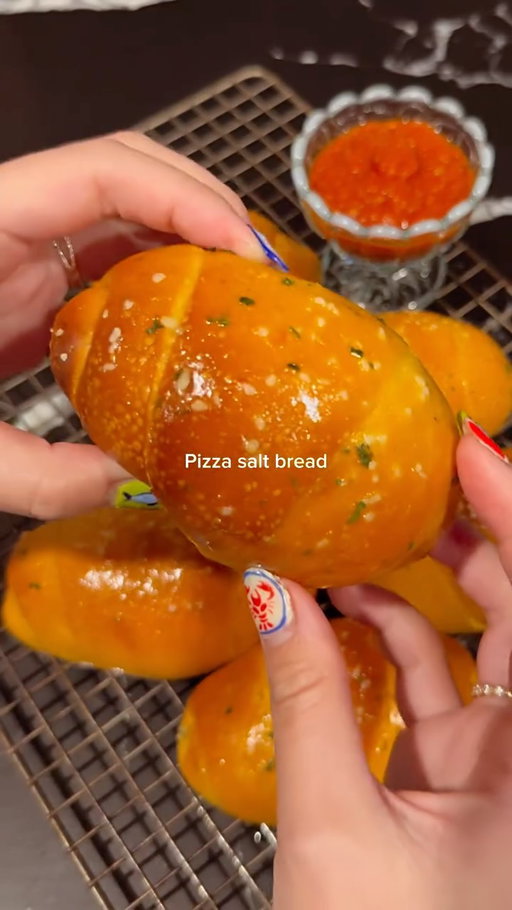 VIRAL SALT BREAD RECIPE

Comment “link” and I’ll send all the tools I used! 

VIRAL SALT BREAD RECIPE- But make it pizza! This is my version of pizza salt bread. This week was national pizza week so I ate a bunch of pizza and with trial and error made this pizza salt bread. I started making salt bread using @erinscozykitchen ‘s recipe and have been experimenting for a month now. Big things - tomato acid can kill yeast, counteract that by adding some more sugar, using tomato paste, and making a nice warm environment for yeast to thrive. I use my oven with a pot of boiling water inside. 

Easy process, I want to experiment with Nutella salt bread next! #bakingreel #saltbread #shiopan #pizza baking