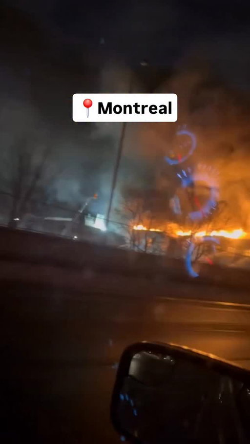 A significant blaze erupted in Montreal during the early hours of January 21, 2026, severely affecting the Jacques Cartier Bridge (Pont Jacques-Cartier).

📽: @kuaz_trucker38

The four-alarm fire ignited late Tuesday evening—roughly around or just past midnight—in a vacant, heritage-listed structure on avenue De Lorimier, right at the intersection with rue Logan and adjacent to the bridge's access point on the Montreal (Ville-Marie) side. Flames originated on the lower level of the four-story building before rapidly climbing through the upper floors, producing thick smoke and visible fire that persisted into daylight.

In response, Montreal's fire department (SIM) and other officials shut down the entire Jacques Cartier Bridge in both directions out of caution. Heavy smoke was impairing visibility and posing safety hazards, compounded by concerns over potential structural collapse of the burning building. The partial closure (northbound lanes heading into Montreal) kicked in around 2:30 a.m., escalating to a total bidirectional shutdown by approximately 6:15 a.m., which threw morning commuter traffic into chaos for those traveling between the island and the South Shore, including areas like Longueuil.

More than 100 firefighters—some reports citing up to 150—were deployed to combat the ongoing fire, which remained uncontrolled several hours later. Importantly, the bridge sustained no direct damage or flames; the disruptions arose solely from the proximity of the blaze and its hazards.