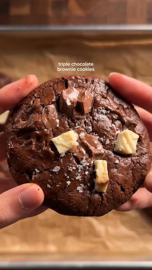 triple chocolate brownie cookies
1 1/3 cups (227g) bittersweet or semisweet chocolate
6 tbsp (85g) unsalted butter
1/3 cup (65g) white sugar
2/3 cup (135g) brown sugar
2 eggs
1 tsp vanilla
3/4 cup (95g) flour
1/4 cup (20-25g) cocoa powder
1 tsp (1g) espresso powder
1/2 tsp (2g) salt
1 cup total chocolate chips (i used 1/3 cup each of white, milk, dark)
microwave butter and chocolate in 15-20 second intervals until melted and smooth. in another bowl, beat the eggs and sugar well then slowly add into the choco/butter mixture. mix in the vanilla. in another bowl, whisk the flour, cocoa powder, salt, and espresso powder. gently fold in the dry to the wet. bake at 350 for about 10-12 min or until the tops are nicely crackled. optional: top with flakey salt!