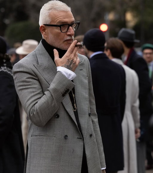 Memories of Pitti109 @pittimmagine @pittiuomo_official - @domenicogianfrate wears an @e.po.ca jacket while being photographed by Scott Schuman @thesartorialist