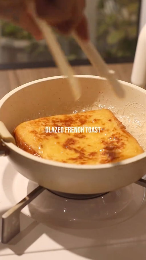 🍞🍩 Glazed French Toast

📝 Recipe

30ml • Milk
1 Egg
Cinnamon Ground
1 Thick Slice • Bread
1 tbsp • Butter
1 tbsp • Sugar
2 tbsp • Water

Instructions:

• French Toast Mixture
- whisk egg, milk, and cinnamon ground together
- dip/coat the bread in the mixture

• Cooking; Bread
- heat pan in medium heat with butter
- fry the bread on both sides until golden brown

• Sugar Glaze
- add water and sugar in pan
- turn on the stove in low heat
- once the sugar starts to bubble, put the french toast in to coat the bread with sugar
- flip the bread so the sugar evenly coat the bread

//

Easy recipe at home with IC! 🍞👩‍🍳

This taste like a glazed donut, but very very soft! I should’ve used a thicker bread for this tbh, it would be better~

—

#frenchtoast #homecafe #breadrecipe #toast