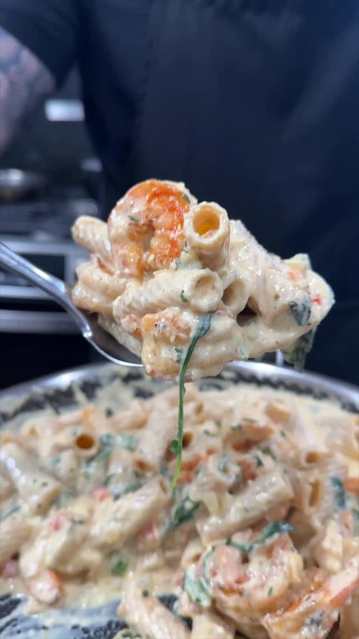 New Series!! Make It Happen, But Make It Healthy! 

Checkout this High Protein Cajun Shrimp Alfredo

I’ll be remixing all of my most popular recipes and making them significantly healthier… higher in protein and macro friendly. Let me know what you want to see next!

Ingredients (4 servings)

Pasta
	•	12 oz protein rigatoni 

Shrimp
	•	1½ lb raw shrimp, peeled & deveined
	•	1 tsp olive oil
	•	Cajun seasoning and AP 

Veggies
	•	1 red bell pepper, thin sliced
	•	1 yellow onion, thin sliced
	•	3–4 cups fresh spinach

High-Protein Alfredo Sauce
	•	1½ cups low-fat cottage cheese
	•	¾ cup unsweetened almond milk (or skim milk)
	•	½ cup freshly grated Parmesan
	•	3 cloves garlic
	•	1 tbsp butter or olive oil
	•	AP seasoning, Cajun, chicken bouillon 
Instructions

1️⃣ Cook the Pasta
	•	Boil protein rigatoni in well-salted water
	•	Cook al dente (don’t overcook)
	•	Reserve ½ cup pasta water, then drain

2️⃣ Sear the Shrimp
	•	Heat a large skillet over medium-high
	•	Add olive oil
	•	Season shrimp with paprika, garlic powder, salt & pepper
	•	Sear 1–2 minutes per side until just cooked
	•	Remove shrimp and set aside

3️⃣ Sauté Veggies
	•	Same skillet, medium heat
	•	Add onions and peppers
	•	Cook 4–5 minutes until soft and lightly caramelized
	•	Add spinach last and wilt (30–60 seconds)

4️⃣ Make the Alfredo Sauce (Blender = Key)

5️⃣ Bring It Together
	•	Add cooked pasta to veggie skillet
	•	Pour in sauce + splash of pasta water
	•	Toss to coat and loosen
	•	Fold shrimp back in
	•	Adjust seasoning

Finish with:
	•	Extra Parmesan
	•	Cracked black pepper
	•	Optional chili flakes

Macros (Approx. Per Serving)
	•	Calories: ~550
	•	Protein: ~45–50g
	•	Carbs: ~45–50g
	•	Fat: ~12–15g

#mrmakeithappen #healthyrecipe #pasta #seafood #shrimpalfredo