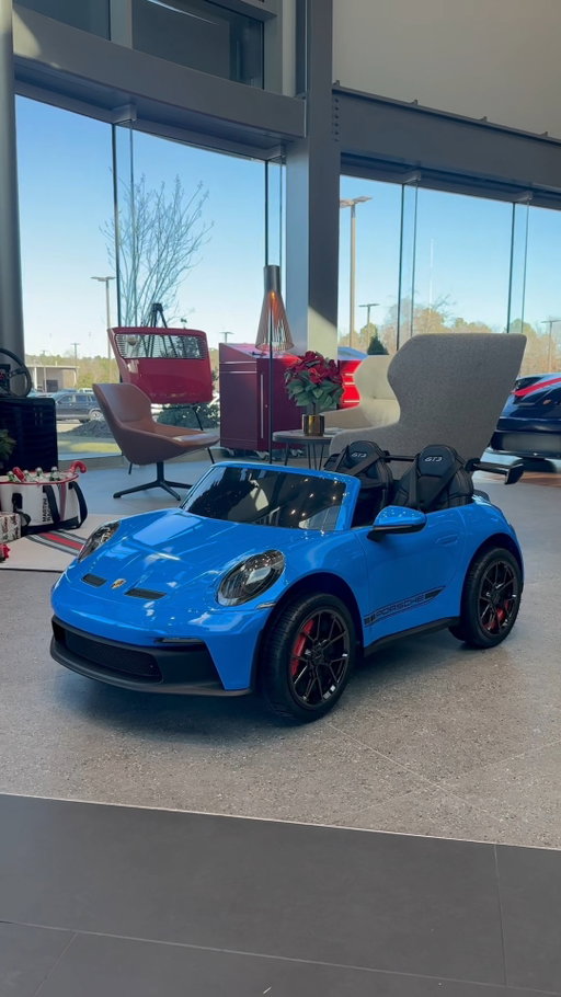Start their Porsche journey early.
The 24V Porsche 911 GT3 Kids Ride-On Car in striking Shark Blue delivers fun-sized performance for the next generation of drivers. With room for two, it’s the perfect gift for your little Porsche fan.

Available now at Porsche Little Rock—because the love for Porsche starts young.