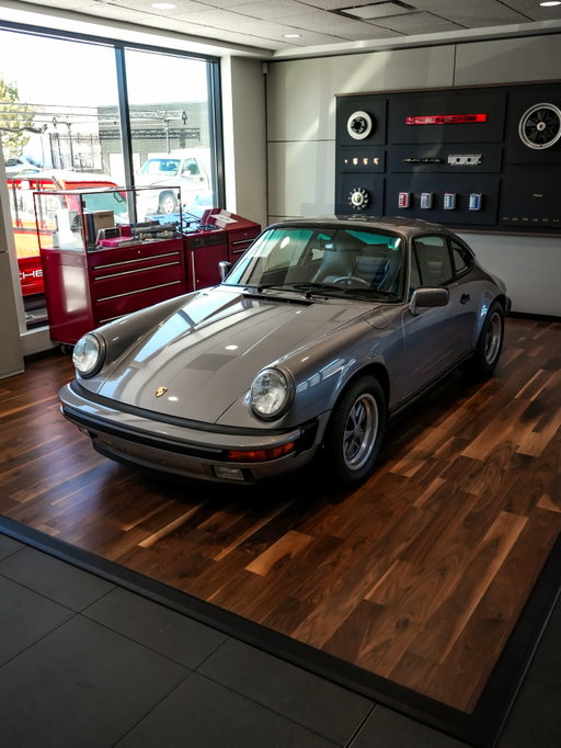 1988 Porsche 911 Commemorative Edition in Diamond Blue Metallic with only 11,329 original miles displayed in our #porscheclassic corner. Follow the journey of this well-preserved, single-family owned piece of Porsche history. 

#porschechallenge26 #porsche #aircooled #gbody