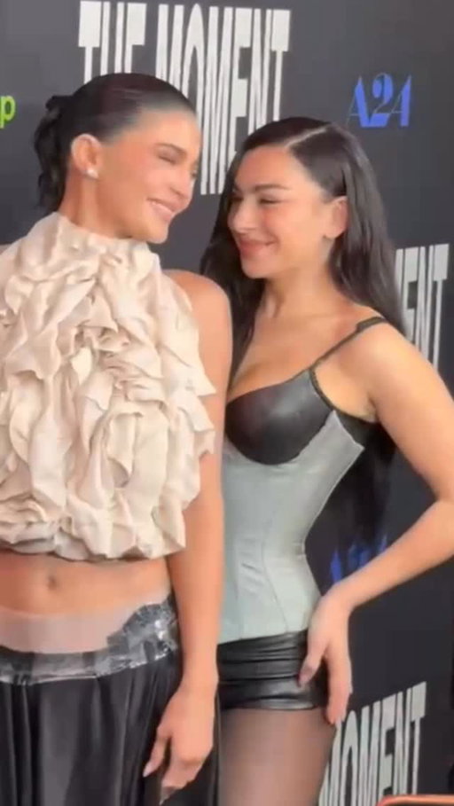 #KylieJenner and #CharliXCX sharing a moment at ‘The Moment’ premiere tonight in LA. 

📷: @missangmelero / TZR