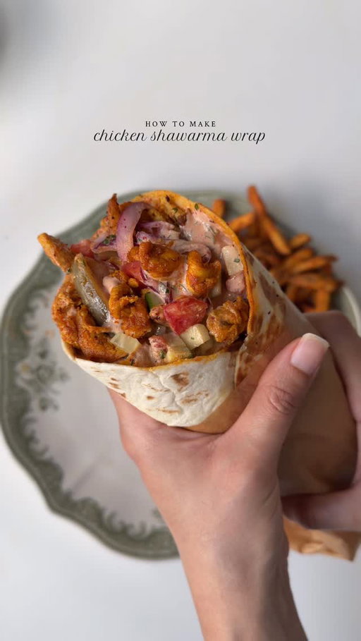 Chicken shawarma wrap 🌯 

Ingredients 

For the chicken:

2 lb boneless chicken breast/ thighs, cut into thin slices 
1 tbsp fresh garlic, finely minced 
2 tbsp mayonnaise 
1 tbsp olive oil
1 tbsp smoked paprika powder 
1 tsp garlic powder 
1 tsp black pepper powder 
1/2 tsp cumin powder 
1/2 tsp coriander powder 
1 tsp red chili powder 
1/2 tsp turmeric powder 
Salt to taste
1 tbsp fresh lemon juice 
3 tbsp clarified butter/oil for cooking 

For the sumac onions

1 large red onion, thinly sliced and washed 
1 tbsp fresh parsley, chopped 
1 tbsp sumac 
1 tsp lemon juice 
Salt to taste

For the garlic sauce :

1/3 cup mayonnaise 
1/3 cup sour cream
3-4 tbsp butter milk ( less or more to adjust the consistency of the sauce )
2 tbsp ketchup 
2 tbsp hot sauce 
1 tsp freshly chopped parsley 
1 tsp lemon juice 
1 tbsp garlic powder 
1 tbsp smoked paprika powder 
Salt to taste
1/2 tsp black pepper 

To assemble:

6 tortilla wraps
1/2 cup cucumber, chopped 
1/2 cup tomatoes, chopped 
Spiced French fries
1/2 cup pickled cucumbers 

Method:

In a mixing bowl add chicken, season with salt, pepper, garlic powder, smoked paprika powder, turmeric, red chili powder. Add in the mayonnaise, garlic, oil and lemon juice. Mix until well combined. Cover and let it marinate for at-least 1 hour.

Prepare the sauce by mixing mayonnaise, sour cream, buttermilk, salt pepper, paprika powder, garlic powder, hot sauce, lemon juice, ketchup in a bowl. Whisk until smooth and creamy. 

Make the sumac onions by mixing onions, parsley , sumac, salt lemon juice in bowl.

In a pan, heat clarified butter over medium heat. Once melted, add the chicken and cook in batches, ensuring not to overcrowd the pan. Cook for about 8-10 minutes, tossing occasionally, until the chicken is fully cooked through.

Assemble the wrap by warming the tortilla, then adding sauce, Sumac onions, chicken, tomatoes, cucumber, pickled cucumbers, French fries, and more sauce. Close it and serve one.

#shawarma #recipe