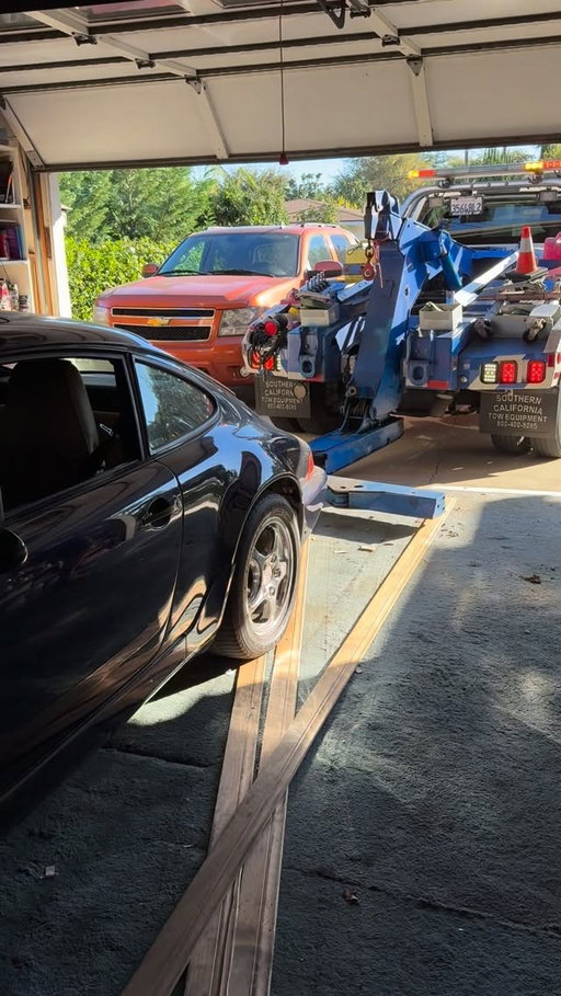 This 964 has been sitting in a garage for 10 years, flat tires, dead battery, ready to be towed out and put back on the road #porsche911 #964 #classicrestorationchallenge #porschechallenge26