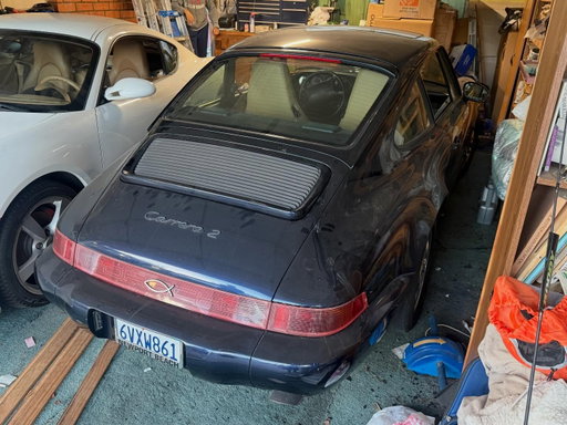 The resting ground where this 964 sat for a decade out of the elements in a garage next to a Cayman S. After 10 years the owner reached out to our store ready to get this car back on the road and onto the next owner who could really give it the TLC it needs . . . #porscheclassicrestorationchallenge #porschechallenge26