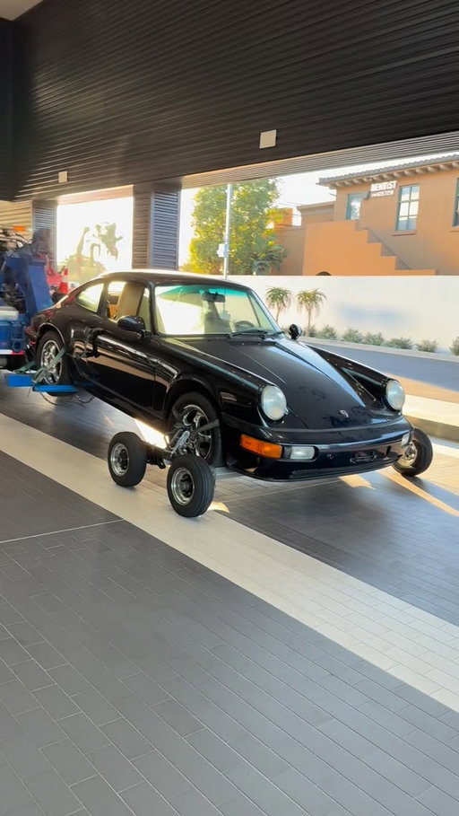 Out of the garage and into the service drive to undergo a restoration from Porsche Newport Beach #porscheclassicrestorationchallenge #classicrestorationchallenge #porsche911 #964 #porschechallenge26