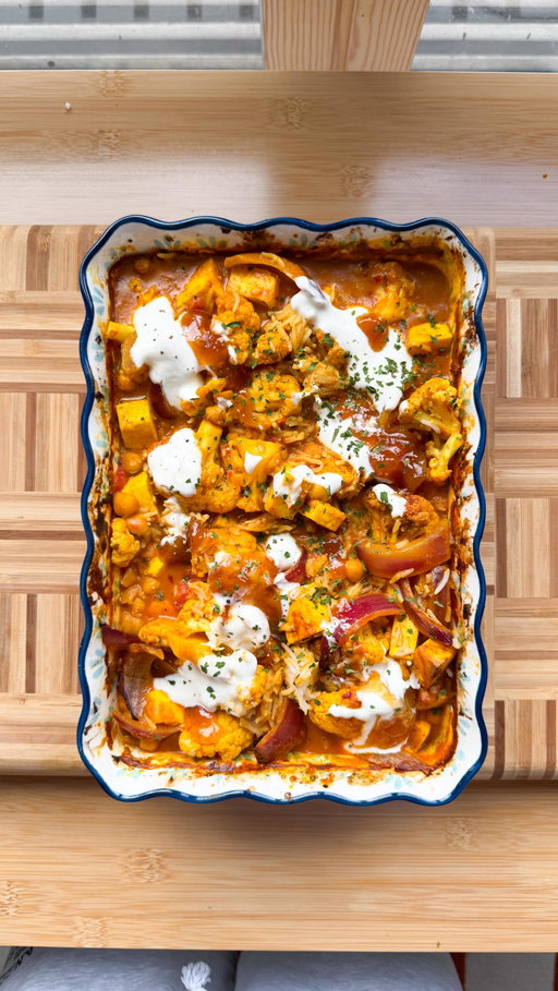 WEEK 5 | MEAL 1: BABE ON A BUDGET TAKES THE WEEKLY SHOP 🛒🛒🩷🩷

MEAL 1: PANEER, CHICKPEA & CAULIFLOWER TIKKA TRAY BAKE

🍴 3 portions*
⏰ 35 minutes 
Store cupboard essentials: oil, minced ginger & garlic, chilli flakes, dried parsley

Ingredients

- Half head of cauliflower
- 1 red onion
- 1 block paneer
- 1tsp minced ginger & garlic
- 1tsp chilli flakes,
- 2-3tbsp tikka paste (I used patak’s paste pots)
- 300ml-400ml coconut milk 
- 200g chickpeas
- 200g chopped tomatoes
- 1 packet of microwavable rice
- 2tbsp yoghurt 
- 1tbsp mango chutney 
- 1tsp dried parsley 

To make...

🥘 Preheat your oven to 200 degrees. 

🥘 Chop up your cauliflower into florets - smaller than mine are here! 

🥘 Add to a baking dish along with diced up red onion & cubed paneer & chickpeas. 

🥘 Add a drizzle of vegetable oil, minced ginger & garlic, chilli flakes, tikka paste, coconut milk, chopped tomatoes. 

🥘 Cover with foil & pop it into the oven for 15-20 minutes.

🥘 Remove from then oven, give everything a mix and add a little more coconut milk or a splash of water if need. 

🥘 Remove the foil and pop back into the oven for 10-15 minutes or until the cauliflower is cooked & soft. Mine took a little longer than this so make sure you make your cauliflower pieces smaller! 

🥘 Remove from the oven and stir through your cooked microwavable rice - or actual rice if you have some in the cupboard! 

🥘 Serve with yoghurt, mango chutney (optional but I always have some kicking about) and some dried parsley. Enjoy !! xx

*BULKING OUT OR DOWN? 

Honestly, this already serves 3 healthy portions. You can bulk it up with extra veggies / rice! Otherwise, save your half head of cauliflower & make my cauli wings!

Save any coconut milk for when reheating - add a splash before you microwave to keep it saucy!

🫙  If freezing, keep the rice & yoghurt separate and re-add these elements one defrosted and reheated. Otherwise, store in the fridge in an airtight container and reheat until piping hot. 

#babeonabudget #weeklyfoodshop #veggierecipes