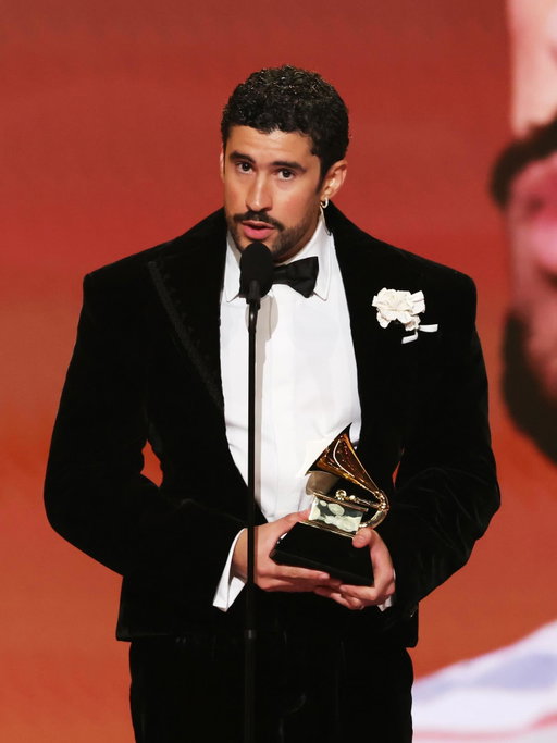 THE SCHIAPARELLI MAN 
@BadBunnypr makes history at the 68th Grammy’s as the first Latin artist with a Spanish-language album to win ‘Album of the year’ in Schiaparelli’s first Haute Couture red carpet menswear look imagined by @DanielRoseberry. 
He also took home the awards for ‘Best Música Urbana Album’ and ‘Best Global Music Performance’.

Benito’s look is a custom Schiaparelli black velvet smoking ensemble, inspired by the original bottle of the Maison’s signature fragrance, ‘Shocking’. The look was adorned with a measuring-tape lapel and a laced-up back.

#schiaparelli #badbunny #grammys