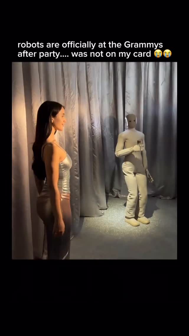 🤖
The 2026 Grammy Awards after party delivered one of the most memeable pop culture moments of the night when robots entered the scene turning a celebrity filled event into something straight out of the future The appearance of Neo, the humanoid robot developed by 1X Technologies, instantly caught attention online and sparked jokes across social media

What made the moment even more surreal was the contrast Music like Until I Found You by Stephen Sanchez featuring Em Beihold played in the background while cutting edge robotics mingled with artists and industry insiders The collision of vintage romance and futuristic technology perfectly summed up where pop culture currently stands

Award show after parties have always pushed spectacle but this moment symbolized something bigger Robots are no longer limited to tech demos or research labs They are now stepping into entertainment spaces traditionally centered on human creativity emotion and performance

Online reactions ranged from humor to disbelief with many joking that even robots are now invited to Grammys after parties The clip spread quickly because it felt like a cultural snapshot of a future that suddenly arrived faster than expected

Whether viewed as funny ironic or slightly unsettling the presence of Neo at the Grammys after party highlighted how rapidly technology is integrating into pop culture Moments like this resonate because they blur the line between science fiction and reality turning a single after party clip into a viral symbol of where entertainment is headed next

#1x