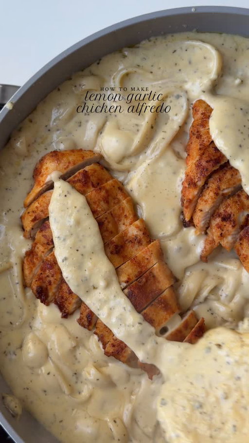 Lemon garlic chicken Alfredo 🍋🧄

Ingredients 

For the chicken:

1 chicken breast, halved lengthwise into even thickness 
Salt to taste
1 tsp smoked paprika powder 
1 tsp garlic powder 
1/2 tsp black pepper powder 
1 tbsp oil ( for marinating ) 
2 tbsp oil for cooking 

For the sauce:

1 1/2 tbsp all purpose flour 
5 tbsp butter 
1 1/2 cup unsweetened heavy whipping cream, room temp
Salt to taste
1/2 tsp black pepper 
1 tsp garlic powder 
1 tsp Italian seasoning 
1 tsp dried parsley 
3/4 cup freshly grated Parmesan cheese 
1 tbsp lemon zest
2 tsp lemon juice 

To assemble:

9 oz fettuccine 
1 cup pasta water

Method: 

Pat the chicken dry and season it with salt, pepper, garlic powder, and smoked paprika powder. Add oil and mix well to combine. Let it marinate for 30 minutes.

Bring a large pot of generously salted water to a boil. Cook fettuccine until al dente. Reserve 1 cup pasta water, then drain.

In a pan add oil add the marinated chicken and cook for 4–5 minutes per side on medium-high heat, depending on thickness.
Remove the chicken in the same pan add butter once the butter is melted. Add the all purpose, flour.  Whisk constantly for 30-40 sec to cook out the raw taste (do not brown). Add in heavy whipping cream. Mix and add salt, garlic powder, black pepper, Italian seasoning, dried parsley.

Simmer gently for 3–4 minutes, stirring, until slightly thickened.
Reduce heat to low, then stir in Parmesan cheese until melted and smooth.
Add lemon zest and lemon juice. Taste and adjust salt or lemon if needed.

Add cooked fettuccine to the sauce.
Add ¼ cup at a time, as needed .
Toss gently, adding reserved pasta water a little at a time until the sauce is silky and coats the pasta beautifully. Add sliced chicken and toss again. Simmer on low for 1–2 minutes to let everything come together. Garnish with extra Parmesan, parsley, or a pinch of black pepper.
Optional: a tiny drizzle of olive oil or butter on top for extra gloss 

#chickenalfredo #lemongarlic #pasta #fettuccine
