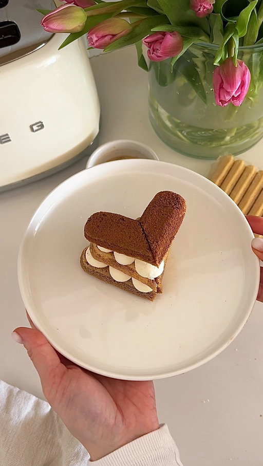 Turning simple moments into something sweet for Valentine’s Day 💕
A tiny heart dessert to share with someone you love (or keep just for yourself )

Ingredients
• ½ cup mascarpone
• ½ cup heavy cream
• 1½ tbsp powdered sugar
• ½ tsp vanilla extract
• ⅓–½ cup espresso
• Ladyfingers
• Cocoa powder

#aestheticblog #beautifulfood #homediaries #foodaesthetic #cozyhomes