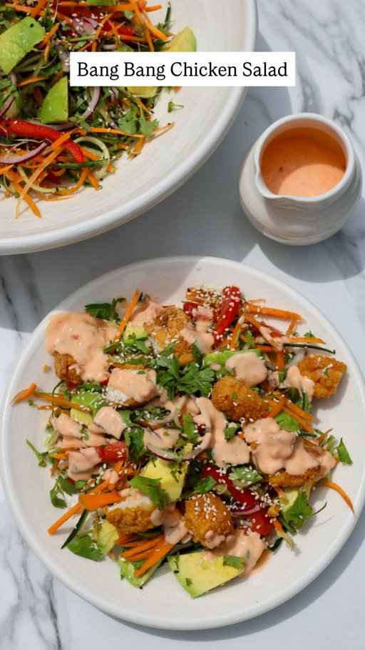 Bang Bang Chicken Salad 🥗🔥

This is your sign to turn that freezer chicken into something delish. Fresh, crunchy, creamy, sweet with a little kick… and done in minutes.

Salad:
Frozen chicken of choice (I love karaage)
1 cucumber, julienned
1 carrot, julienned
½ red onion, sliced
2 spring onions, sliced 
1 @the.avo.tree avocado, diced
1 handful @broccoboost 
¼ cup coriander

Bang Bang Sauce:
¼ cup low-fat mayo
¼ cup Greek yoghurt
¼ cup sweet chilli sauce
1 tbsp sriracha 
Juice of 1 lime

Cook chicken according to packet instructions.
Mix sauce ingredients together. 

Toss all veges together, drizzle generously with the sauce, then finish with sesame seeds on top. Unreal.
#easyrecipes #healthyrecipes #dinnerideas #mealprep #foodie