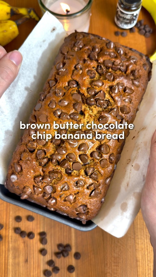 Brown Butter Chocolate Chip Banana Bread 🍌

Comment “Recipe” and I’ll send you the full recipe card for free!!

For all of you asking about the app, search “Osta Recipes” on the app or Google play store ‼️🫶

I have tested over 100 banana bread recipes and after countless adjustments, these officially have claimed the #1 spot 👑

Ingredients
-3 ripe bananas (brown spots = flavor)
-9 tbsp unsalted butter (browns down to ~½ cup)
-1 large egg, room temp
-¾ cup brown sugar
-¼ cup white sugar
-1½ cups all-purpose flour
-1 tsp baking soda
-½ tsp baking powder
-½ tsp salt
-1 tsp cinnamon
-1 tsp vanilla extract or paste
-1 to 1½ cups semi-sweet chocolate chips (measure with your heart)

Instructions:
1. Add butter to a saucepan over medium heat. Stir often. It’ll melt, foam, sizzle, then turn golden with a nutty smell. Once browned (do not burn), pour into a  bowl and place in the freezer for 5 mins. You want it warm, not hot.
2. In a large bowl, mash bananas until mostly smooth. Add 1/2 cup of the browned butter, brown sugar, white sugar, egg, and vanilla. Whisk for 1 to 2 mins until glossy.
3. Add flour, baking soda, baking powder, salt, and cinnamon. You can mix these in a separate bowl first, or be lazy like me and add them straight in. Just mix very thoroughly so everything is evenly distributed.
4. Preheat to 350°F / 175°C. Once no dry flour remains, fold in about 1 cup of chocolate chips. Save the rest for topping.
5. Line or grease a loaf pan and pour in the batter. Sprinkle remaining chocolate chips on top.
Bake for 60 mins, loosely covering with foil halfway through to prevent over-browning.
6. Insert a toothpick into the center. It should come out with a few moist crumbs, not wet batter. If needed, bake an extra 5 to 10 mins.
7. Let cool slightly, then slice. Enjoy 🤠