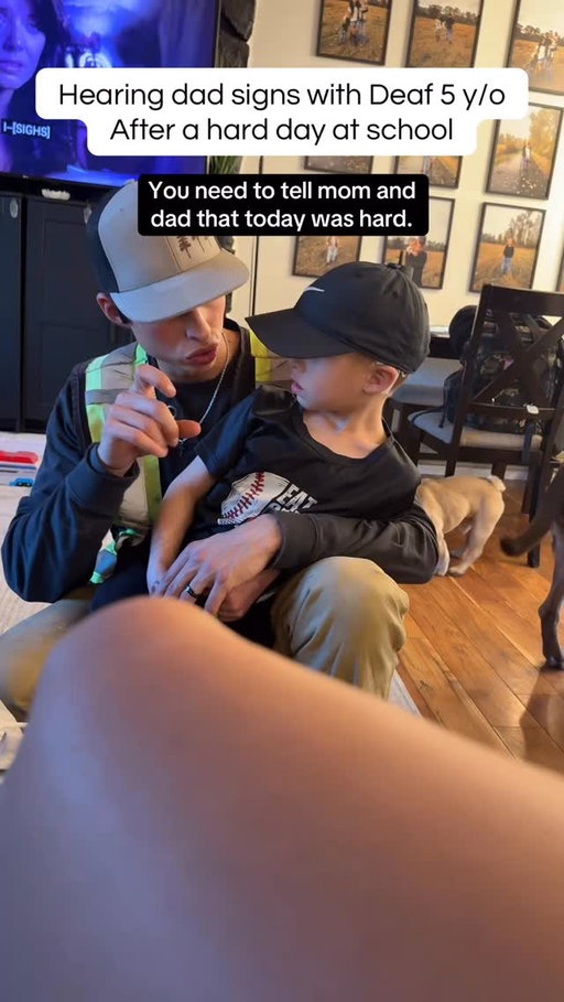Hearing dad signs with Deaf son after a hard day #cochlearimplant #signlanguage #deaf #asl #parenting