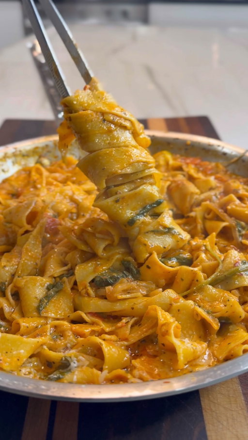 One skillet, 15 minutes, and you’ve got a pasta that tastes like it came straight out of a chef’s kitchen. No reason to drop $25 on this at a restaurant when you can make it at home yourself 🤤🤌🏾

One Pan Creamy Tomato Spinach Pasta

Ingredients:

10–11 oz pappardelle or tagliatelle nests (about 6 nests, or substitute spaghetti)
10 oz cherry tomatoes, red and yellow, halved
1 small red onion, thinly sliced
6 garlic cloves, thinly sliced
2 handfuls fresh spinach
4 tbsp crushed tomatoes
1 tbsp tomato paste
1 tsp dried oregano
1 tsp dried basil
½ tsp chili flakes (optional)
1 cup plant-based cream such as oat cream, or heavy cream
2 ½ cups vegetable broth
3–4 tbsp olive oil
Salt and black pepper to taste
Parmigiano Reggiano, grated

Pro tip: Mix the crushed tomatoes and tomato paste together before adding them to the skillet for a smoother sauce.

Instructions:

Place the pasta nests in the center of a large pan. Arrange the cherry tomatoes, red onion, garlic, and spinach around them.

Spoon the tomato mixture over the pasta and drizzle with olive oil. Season with oregano, basil, chili flakes if using, salt, and pepper.

Pour in the cream and vegetable broth until the pasta is mostly submerged. Cover with a lid and bring to a gentle boil over medium heat.

Cook for 11–13 minutes, stirring occasionally, until the pasta is tender and the sauce has thickened into a creamy consistency.

Finish with a generous handful of grated Parmigiano Reggiano, stirring it in just before serving. Garnish with extra cheese on top.

#pasta #italianfood #pastalover #instafood #foodstagram
