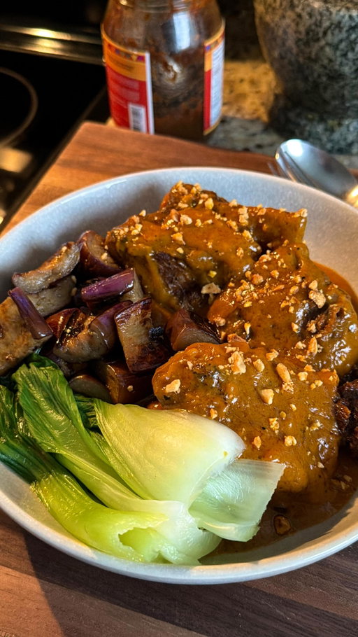 Short Rib Kare Kare 

As much as I love the oxtail version, short rib is equally my top pick for this. I’d normally never make Kare Kare on a random weeknight unless a) I know I’ll be home all day or b) It’s for someone worth the time.

I have both versions up on my blog now, and the oxtail version has a slightly different method (which I’ll update at some point). Basically you can use either homemade toasted rice powder or toasted rice flour interchangeably. I went with the latter since it’s one less step to do and it works well (if not similar) as a thickener.

The recipe is live on the blog: https://www.iankewks.com/beef-short-rib-kare-kare-recipe/

Or just comment “Beef” and I’ll DM you the full recipe! (make sure to follow so you receive it)