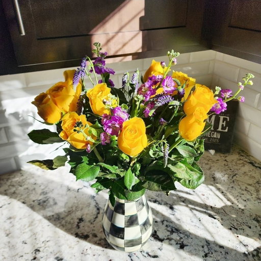 Sunday Section {boyfriend edition}

Yes, you read that right! Jarred gave me this stunning arrangement for Valentine's Day that he arranged himself! 🤯

When he came into our kitchen holding it in his hands, I just about fell over. 

What's extra special is that he chose my two favorite colors 🥹💜💛