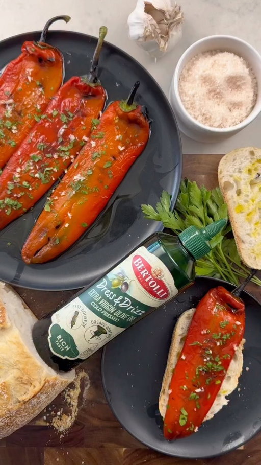 @bertollioliveoil_australia Olive Oil Mediterranean Peppers

This is soul food right here, the secret ingredient that brings it all together is the world’s #1 olive oil brand, Bertolli.

All you need to bring this dish alive is:

5 red peppers
2 cloves garlic, finely chopped
1/4 cup parsley, finely chopped
Pinch of salt
Splash of white vinegar
A healthy amount of Bertolli Extra Virgin Olive Oil
Serve on sour dough thick cut bread.

Once you’ve bbq’d the red peppers Pop them in a container with a lid and let them sweat and then peel. Drizzle some Bertolli Olive Oil on the plate and lay the peppers on top.
Drizzle some more oil on top and season with salt, add the garlic and finally the parsley.

The Bertolli Dress and Drizz
Unbreakable bottle is perfect for clumsy people like me and the nozzle control is perfect for the ideal pour. pick up your Bertolli Dress & Drizz Extra Virgin Olive Oil at your local Coles.

#bertolli #bertollidressanddrizz