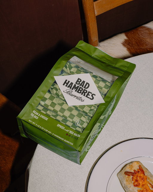 Bad Hambres 3.0

Same burritos. New packaging.

It was always the goal to get custom packaging (that checked the FDA compliance boxes). The catch is it’s not cheap and order minimums are insanely high.

We honestly weren’t sure we’d get here bootstrapped, so this one feels like a win.

Also, bittersweet. We loved the paper wrappers, so did you. We’re not plastic people, but the paper could get soggy and didn’t protect your burritos against air in your freezer.

We had to make the change, but it was going to be on our terms.

The packaging still had to have soul, nothing you’d pick up in the freezer aisle, tied to our roots in the Southwest, and built around what you told us matters most.

Bonus points, it locks in flavor, fits in your freezer door, and finally has the nutrition facts and cooking instructions.

We’re still learning as we go, but this is a level up.

Crazy to think we started in our home kitchen. Thanks for building this with us.

P.S. If you miss the paper wrappers, they’ll be back for collabs... for now.