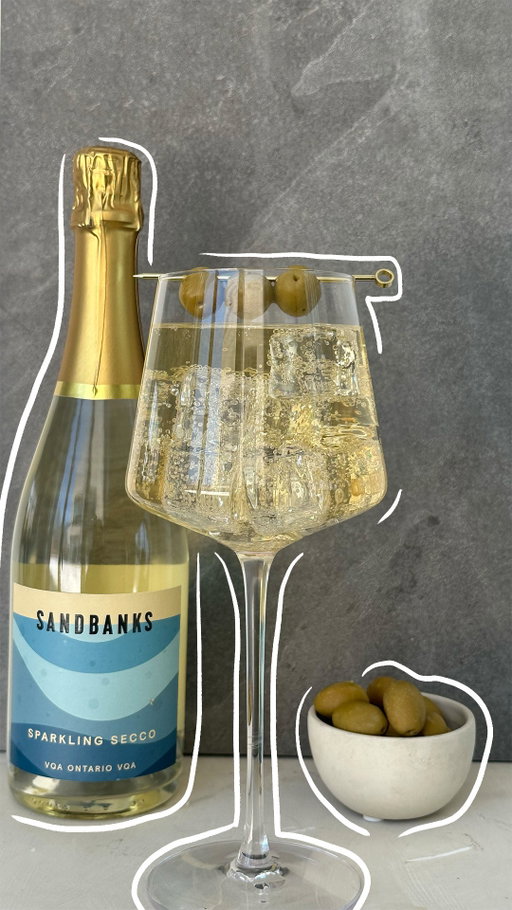 A spritz, with a ‘tini’ upgrade 🍸✨ ⁠
⁠
Recipe:⁠
 - 1/2 oz vodka ⁠
- 3/4 oz vermouth⁠
 - 3/4 oz olive brine ⁠
- 2.5 oz Chilled Sparkling Secco ⁠
- 2 oz club soda ⁠
⁠
Tag us if you try it! ⁠
⁠
Find our Sparkling Secco at your local Wine Rack, LCBO, and online through the link in our bio.⁠
⁠
#sandbankswinery #PECWinery #princeedwardcountywine #wineoftheday #winelife⁠